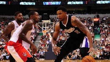 Oct 5, 2014; Vancouver, British Columbia, CAN; Sacramento Kings forward Rudy Gay (8) moves past Toronto Raptors forward Terrence Ross (31) during the second half at Rogers Arena. The Toronto Raptors won 99-94. Mandatory Credit: Anne-Marie Sorvin-USA TODAY Sports