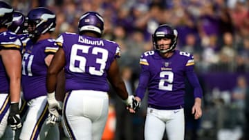 MINNEAPOLIS, MN - OCTOBER 22: Danny Isidora #63 of the Minnesota Vikings celebrates a successful field goal attempt with kicker Kai Forbath #2 in the first half of the game against the Baltimore Ravens on October 22, 2017 at U.S. Bank Stadium in Minneapolis, Minnesota. (Photo by Hannah Foslien/Getty Images)
