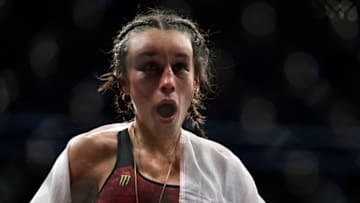 LAS VEGAS, NEVADA - MARCH 07: Joanna Jedrzejczyk of Poland reacts after her split-decision loss to Zhang Weili of China in their UFC strawweight championship fight during the UFC 248 event at T-Mobile Arena on March 07, 2020 in Las Vegas, Nevada. (Photo by Chris Unger/Zuffa LLC)