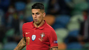 LISBON, PORTUGAL - OCTOBER 07: Joao Cancelo of Portugal controls the ball during the international friendly match between Portugal and Spain at Estadio Jose Alvalade on October 7, 2020 in Lisbon, Portugal. (Photo by Octavio Passos/Getty Images)