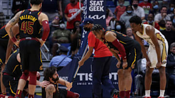 Dec 28, 2021; New Orleans, Louisiana, USA; Cleveland Cavaliers guard Ricky Rubio (3) injures ankle on a play against New Orleans Pelicans forward Herbert Jones (5) during the second half at Smoothie King Center. Mandatory Credit: Stephen Lew-USA TODAY Sports