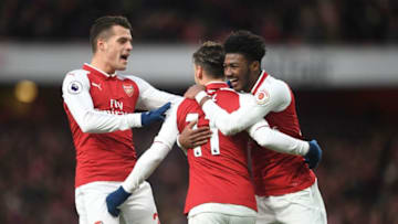 LONDON, ENGLAND - DECEMBER 16: Mesut Ozil celebrates scoring a goal for Arsenal with Granit Xhaka and Ainsley Maitland-Niles during the Premier League match between Arsenal and Newcastle United at Emirates Stadium on December 16, 2017 in London, England. (Photo by David Price/Arsenal FC via Getty Images)