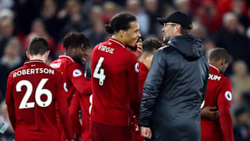 LIVERPOOL, ENGLAND - DECEMBER 02: Jurgen Klopp, Manager of Liverpool and Virgil van Dijk of Liverpool celebrate victory following the Premier League match between Liverpool FC and Everton FC at Anfield on December 2, 2018 in Liverpool, United Kingdom. (Photo by Clive Brunskill/Getty Images)