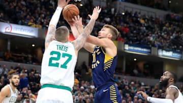 INDIANAPOLIS, INDIANA - DECEMBER 11: Domantas Sabonis #11 of the Indiana Pacers shoots the ball against the Boston Celtics during the game at Bankers Life Fieldhouse on December 11, 2019 in Indianapolis, Indiana. NOTE TO USER: User expressly acknowledges and agrees that, by downloading and or using this photograph, User is consenting to the terms and conditions of the Getty Images License Agreement. (Photo by Andy Lyons/Getty Images)