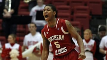 Feb 1, 2014; Muncie, IN, USA; Northern Illinois Huskies guard Travon Baker (5) reacts during the second half against the Ball State Cardinals at John E. Worthen Arena. Northern Illinois won 67-65 in OT. Mandatory Credit: Pat Lovell-USA TODAY Sports