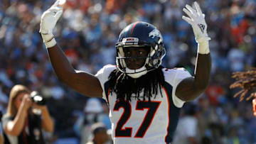 CARSON, CALIFORNIA - OCTOBER 06: Davontae Harris #27 reacts after an interception by A.J. Johnson #45 of the Denver Broncos during the second half of a game against the Los Angeles Chargers at Dignity Health Sports Park on October 06, 2019 in Carson, California. (Photo by Sean M. Haffey/Getty Images)