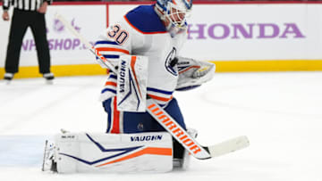 Nov 20, 2023; Sunrise, Florida, USA; Edmonton Oilers goaltender Calvin Pickard (30) blocks a shot against the Florida Panthers during the second period at Amerant Bank Arena. Mandatory Credit: Jasen Vinlove-USA TODAY Sports