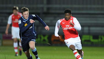 BARNET, ENGLAND - FEBRUARY 23: Ainsley Maitland-Niles of Arsenal takes on Oliver Finney of Crewe during the match between Arsenal U18 and Crewe Alexandra U18 in the FA Youth Cup 5th Round at The Hive on February 23, 2015 in Barnet, England. (Photo by David Price/Arsenal FC via Getty Images)