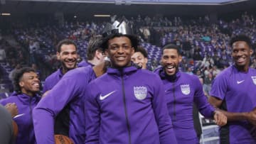 SACRAMENTO, CA - APRIL 11: De'Aaron Fox #5 of the Sacramento Kings wears the Oscar Robertson Triple- Double Award belonging to Garrett Temple #17 prior to the game against the Houston Rockets on April 11, 2018 at Golden 1 Center in Sacramento, California. NOTE TO USER: User expressly acknowledges and agrees that, by downloading and or using this photograph, User is consenting to the terms and conditions of the Getty Images Agreement. Mandatory Copyright Notice: Copyright 2018 NBAE (Photo by Rocky Widner/NBAE via Getty Images)
