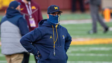 Oct 24, 2020; Minneapolis, Minnesota, USA; Michigan Wolverines head coach Jim Harbaugh looks on during pre game warmups before a game against the Minnesota Golden Gophers at TCF Bank Stadium. Mandatory Credit: Jesse Johnson-USA TODAY Sports