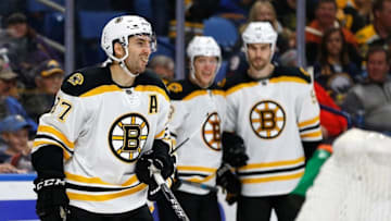 Dec 3, 2016; Buffalo, NY, USA; Boston Bruins center Patrice Bergeron (37) celebrates after scoring the winning goal against the Buffalo Sabres during the third period at KeyBank Center. The Bruins beat the Sabres 2-1. Mandatory Credit: Kevin Hoffman-USA TODAY Sports