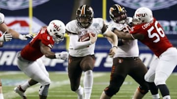 Dec 4, 2015; Detroit, MI, USA; Bowling Green Falcons quarterback Matt Johnson (11) rushes against the Northern Illinois Huskies in the first half of the MAC Championship at Ford Field. Mandatory Credit: Rick Osentoski-USA TODAY Sports