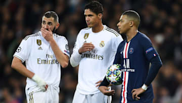 Raphael Varane of Real Madrid and Karim Benzema (Photo by David Ramos/Getty Images)