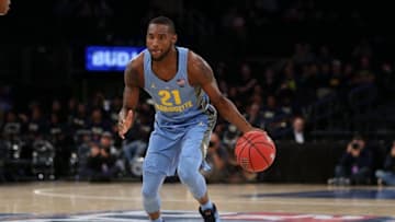Nov 18, 2016; New York, NY, USA; Marquette Golden Eagles guard Traci Carter (21) dribbles during the second half of the third place game against the Pittsburgh Panthers at Madison Square Garden. Pittsburgh won 78-75. Mandatory Credit: Vincent Carchietta-USA TODAY Sports