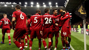 WATFORD, ENGLAND - NOVEMBER 24: Trent Alexander-Arnold of Liverpool celebrates with teammates after scoring his team's second goal during the Premier League match between Watford FC and Liverpool FC at Vicarage Road on November 24, 2018 in Watford, United Kingdom. (Photo by Richard Heathcote/Getty Images)