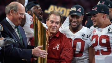 ATLANTA, GA - JANUARY 08: Head coach Nick Saban of the Alabama Crimson Tide celebrates with the CFP Trophy after defeating the Georgia Bulldogs during the College Football Playoff National Championship held at Mercedes-Benz Stadium on January 8, 2018 in Atlanta, Georgia. Alabama defeated Georgia 26-23 for the national title. (Photo by Robin Alam/Icon Sportswire via Getty Images)