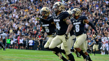 BOULDER, CO - OCTOBER 27: Defensive back Dante Wigley #4 of the Colorado Buffaloes celebrates a second quarter touchdown off of a pick six against the Oregon State Beavers at Folsom Field on October 27, 2018 in Boulder, Colorado. (Photo by Dustin Bradford/Getty Images)