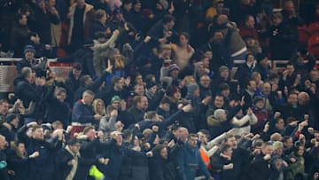 West Ham United fans celebrate their side's third goal during the Premier League match at the Riverside Stadium, Middlesbrough. (Photo by Richard Sellers/PA Images via Getty Images)