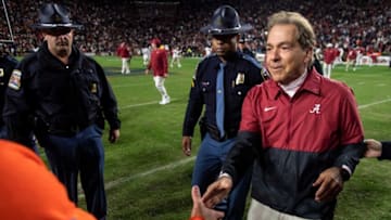 Auburn Tigers head coach Bryan Harsin and Alabama Crimson Tide head coach Nick Saban shake hands after the game during the Iron Bowl at Jordan-Hare Stadium in Auburn, Ala., on Saturday, Nov. 27, 2021. Alabama Crimson Tide defeated Auburn Tigers 24-22 in 4OT.Syndication The Montgomery Advertiser