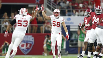 Sep 5, 2015; Arlington, TX, USA; Wisconsin Badgers linebacker Joe Schobert (58) celebrates his first quarter sack with T.J. Edwards (53) against the Alabama Crimson Tide at AT&T Stadium. Mandatory Credit: Matthew Emmons-USA TODAY Sports