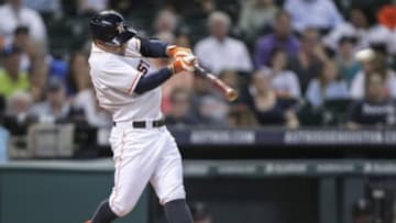 Jul 1, 2014; Houston, TX, USA; Houston Astros second baseman Jose Altuve (27) gets a single during the first inning against the Seattle Mariners at Minute Maid Park. Mandatory Credit: Troy Taormina-USA TODAY Sports