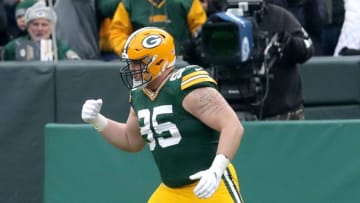 Green Bay Packers defensive tackle Tyler Lancaster (95) celebrates sacing Washington Redskins quarterback Dwayne Haskins (7) during the first half of the Green Bay Packers football game against the Washington Redskins at Lambeau Field in Green Bay on Sunday, Dec. 8, 2019. Photo by Mike De Sisti/Milwaukee Journal SentinelPackers09 Packers 01676
