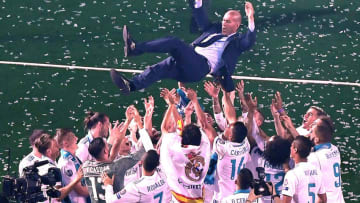 MADRID, May 27, 2018 -- Real Madrid's head coach Zidane is thrown into the air by players during the celebration at Santiago Bernabeu Stadium in Madrid, Spain, on May 27, 2018. Real Madrid claimed the title of UEFA champions league in Kiev on Saturday. (Xinhua/Guo Qiuda via Getty Images)