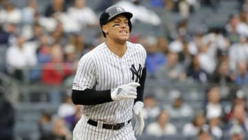 NEW YORK, NEW YORK - APRIL 20: Aaron Judge #99 of the New York Yankees grimaces as he runs out a single during the sixth inning against the Kansas City Royals at Yankee Stadium on April 20, 2019 in New York City. (Photo by Jim McIsaac/Getty Images)