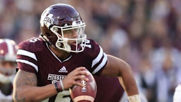 Nov 14, 2015; Starkville, MS, USA; Mississippi State Bulldogs quarterback Dak Prescott (15) looks down field during the game against Alabama Crimson Tide at Davis Wade Stadium. Mandatory Credit: Marvin Gentry-USA TODAY Sports