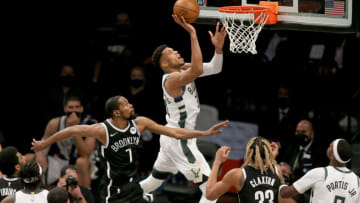Jun 5, 2021; Brooklyn, New York, USA; Milwaukee Bucks power forward Giannis Antetokounmpo (34) drives to the basket against Brooklyn Nets power forward Kevin Durant (7) during the third quarter of game one of the Eastern Conference semifinals of the 2021 NBA Playoffs at Barclays Center. Mandatory Credit: Brad Penner-USA TODAY Sports