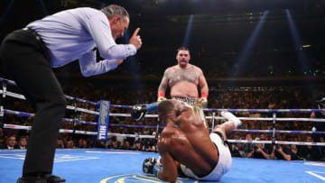 NEW YORK, NEW YORK - JUNE 01: Andy Ruiz Jr knocks down Anthony Joshua in the third round during their IBF/WBA/WBO heavyweight title fight at Madison Square Garden on June 01, 2019 in New York City. (Photo by Al Bello/Getty Images)