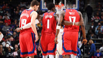DETROIT, MI - FEBRUARY 2: Sviatoslav Mykhailiuk #19, Reggie Jackson #1, and Tony Snell #17 of the Detroit Pistons talk during the game against the Denver Nuggets on February 2, 2020 at Little Caesars Arena in Detroit, Michigan. NOTE TO USER: User expressly acknowledges and agrees that, by downloading and/or using this photograph, User is consenting to the terms and conditions of the Getty Images License Agreement. Mandatory Copyright Notice: Copyright 2020 NBAE (Photo by Chris Schwegler/NBAE via Getty Images)