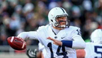 Nov 28, 2015; East Lansing, MI, USA; Penn State Nittany Lions quarterback Christian Hackenberg (14) looks to throw the ball against the Michigan State Spartans during the first quarter of a game at Spartan Stadium. Mandatory Credit: Mike Carter-USA TODAY Sports