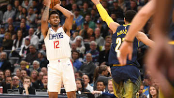DENVER, CO - FEBRUARY 27: Tyrone Wallace #12 of the LA Clippers shoots the ball against the Denver Nuggets at Pepsi Center on February 27, 2018 in Denver, Colorado. NOTE TO USER: User expressly acknowledges and agrees that, by downloading and or using this photograph, User is consenting to the terms and conditions of the Getty Images License Agreement. (Photo by Justin Tafoya/Getty Images)