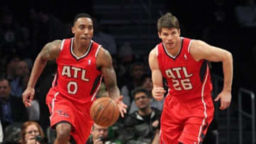 Jan 6, 2014; Brooklyn, NY, USA; Atlanta Hawks point guard Jeff Teague (0) and shooting guard Kyle Korver (26) bring the ball up court against the Brooklyn Nets during the first quarter of a game at Barclays Center. The Nets defeated the Hawks 91-86. Mandatory Credit: Brad Penner-USA TODAY Sports