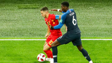 Paul Pogba (R) of France national team and Eden Hazard of Belgium national team vie for the ball during the 2018 FIFA World Cup Russia Semi Final match between France and Belgium on July 10, 2018 at Saint Petersburg Stadium in Saint Petersburg, Russia. (Photo by Mike Kireev/NurPhoto via Getty Images)