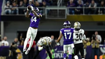 MINNEAPOLIS, MN - JANUARY 14: Stefon Diggs #14 of the Minnesota Vikings leaps to catch the ball in the fourth quarter of the NFC Divisional Playoff game against the New Orleans Saints on January 14, 2018 at U.S. Bank Stadium in Minneapolis, Minnesota. Diggs scored a 61-yard touchdown to win the game 29-24. (Photo by Hannah Foslien/Getty Images)