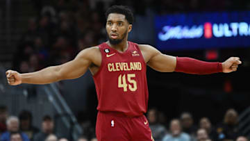 Feb 13, 2023; Cleveland, Ohio, USA; Cleveland Cavaliers guard Donovan Mitchell (45) talks to referee Aaron Smith (not pictured) during the second half against the San Antonio Spurs at Rocket Mortgage FieldHouse. Mandatory Credit: Ken Blaze-USA TODAY Sports