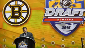 Jun 26, 2015; Sunrise, FL, USA; Boston Bruins general manager Don Sweeney makes the first of three consecutive draft picks in the first round of the 2015 NHL Draft at BB&T Center. Mandatory Credit: Steve Mitchell-USA TODAY Sports