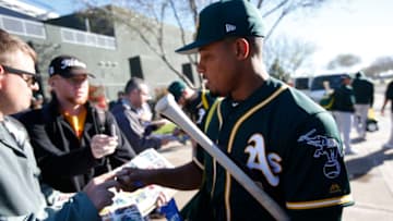 MESA, AZ - FEBRUARY 20: Richie Martin #68 of the Oakland Athletics signs autographs prior to a workout at Fitch Park on February 20, 2017 in Mesa, Arizona. (Photo by Michael Zagaris/Oakland Athletics/Getty Images)