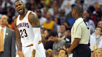 Apr 17, 2016; Cleveland, OH, USA; Cleveland Cavaliers forward LeBron James (23) complains to referee Leroy Richardson (20) during the fourth quarter in game one of the first round of the NBA Playoffs at Quicken Loans Arena. The Cavs beat the Pistons 106-101. Mandatory Credit: Ken Blaze-USA TODAY Sports