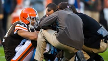 Oct 26, 2014; Cleveland, OH, USA; Cleveland Browns tight end Jordan Cameron (84) is looked at after suffering a concussion against the Oakland Raiders at FirstEnergy Stadium. Mandatory Credit: Ken Blaze-USA TODAY Sports