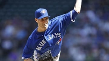 Aug 7, 2013; Seattle, WA, USA; Toronto Blue Jays pitcher J.A. Happ (48) throws against the Seattle Mariners during the first inning at Safeco Field. Mandatory Credit: Joe Nicholson-USA TODAY Sports
