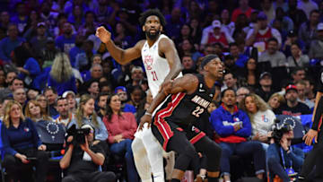 Apr 6, 2023; Philadelphia, Pennsylvania, USA; Philadelphia 76ers center Joel Embiid (21) and Miami Heat forward Jimmy Butler (22) battle for position during the second quarter at Wells Fargo Center. Mandatory Credit: Eric Hartline-USA TODAY Sports