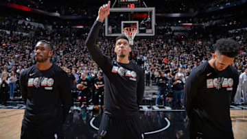 SAN ANTONIO, TX - APRIL 19: Danny Green #14 of the San Antonio Spurs stands for the National Anthem before Game Three of the Western Conference Quarterfinals against the Golden State Warriors in the 2018 NBA Playoffs on April 19, 2018 at the AT&T Center in San Antonio, Texas. NOTE TO USER: User expressly acknowledges and agrees that, by downloading and/or using this photograph, user is consenting to the terms and conditions of the Getty Images License Agreement. Mandatory Copyright Notice: Copyright 2018 NBAE (Photos by Mark Sobhani/NBAE via Getty Images)