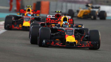 ABU DHABI, UNITED ARAB EMIRATES - NOVEMBER 26: Daniel Ricciardo of Australia driving the (3) Red Bull Racing Red Bull-TAG Heuer RB13 TAG Heuer leads Kimi Raikkonen of Finland driving the (7) Scuderia Ferrari SF70H and Max Verstappen of the Netherlands driving the (33) Red Bull Racing Red Bull-TAG Heuer RB13 TAG Heuer on track during the Abu Dhabi Formula One Grand Prix at Yas Marina Circuit on November 26, 2017 in Abu Dhabi, United Arab Emirates. (Photo by Clive Mason/Getty Images)