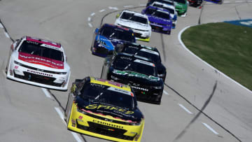 FORT WORTH, TEXAS - OCTOBER 16: Jade Buford, driver of the #48 Big Machine Spiked Coolers Chevrolet, Josh Williams, driver of the #92 WORKPRO Tools Chevrolet, and Brandon Brown, driver of the #68 DFKitCar.com Chevrolet, race during the NASCAR Xfinity Series Andy's Frozen Custard 335 at Texas Motor Speedway on October 16, 2021 in Fort Worth, Texas. (Photo by Sean Gardner/Getty Images)