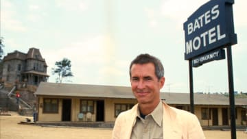 LOS ANGELES, CALIFORNIA - JUNE 24 : Actor and director Anthony Perkins in front of the "Psycho" house at Universal Studios that was used in Alfred Hitchcock's classic 1960 film, June 24, 1985 in Los Angeles, California. (Photo by Bob Riha, Jr./Getty Images)