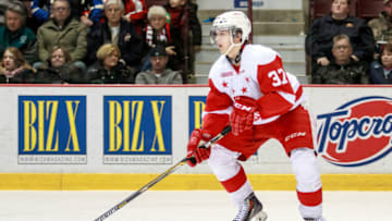 WINDSOR, ON - MARCH 05: Defenceman Gustav Bouramman #37 of the Sault Ste. Marie Greyhounds moves the puck against the Windsor Spitfires on March 5, 2015 at the WFCU Centre in Windsor, Ontario, Canada. (Photo by Dennis Pajot/Getty Images)