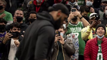 BOSTON, MASSACHUSETTS - NOVEMBER 19: Fans react as LeBron James #6 of the Los Angeles Lakers warms up before a game against the Boston Celtics at TD Garden on November 19, 2021 in Boston, Massachusetts. NOTE TO USER: User expressly acknowledges and agrees that, by downloading and or using this photograph, User is consenting to the terms and conditions of the Getty Images License Agreement. (Photo by Maddie Malhotra/Getty Images)